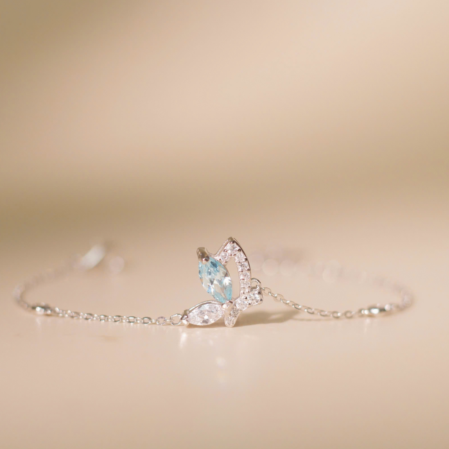 ELVORIA Emmi Butterfly Bracelet with Blue Stone – Platinum Plated 925 Sterling Silver